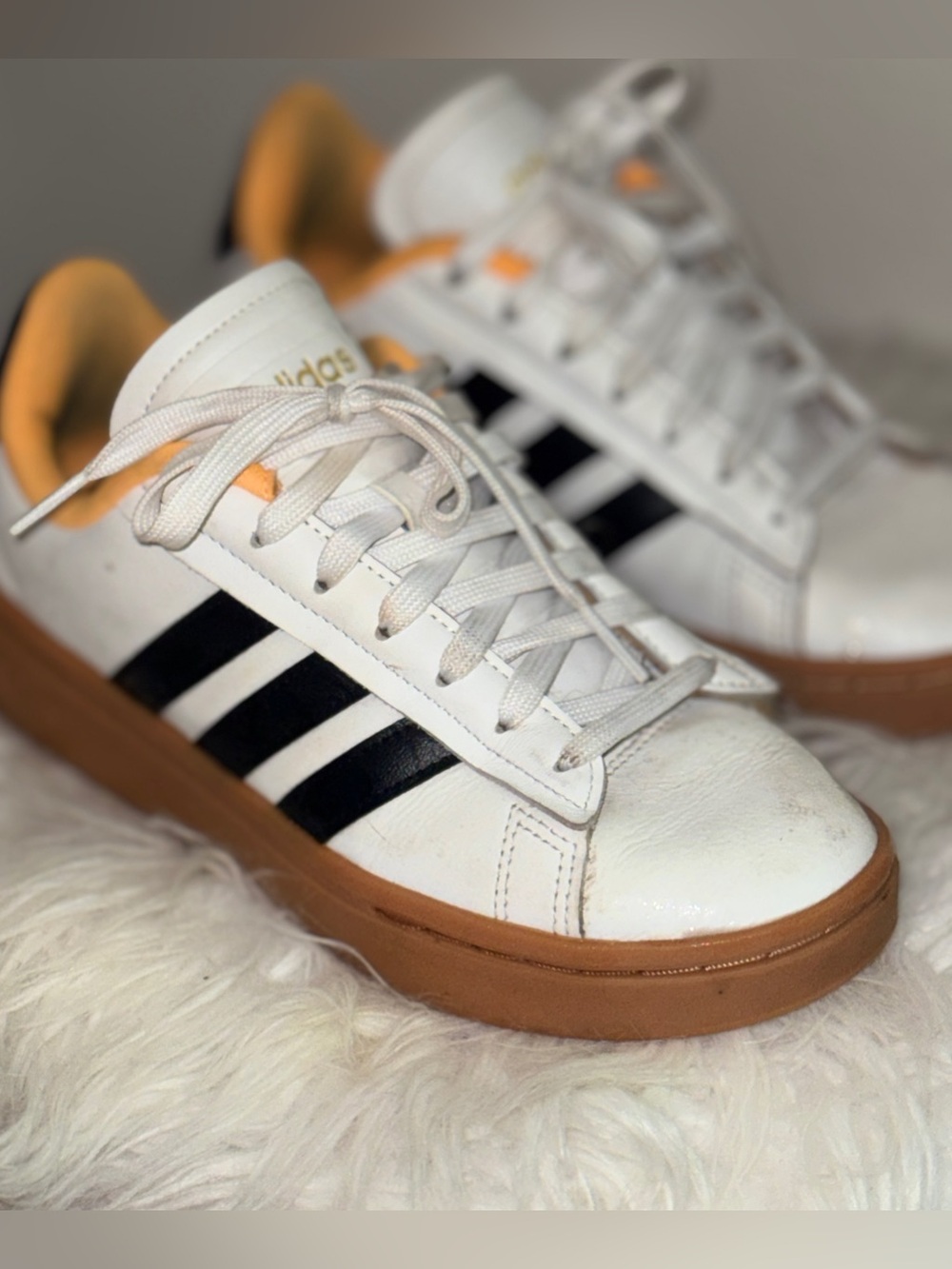 Women’s Adidas - white with Black Stripes, orange/yellow lining and gum sole